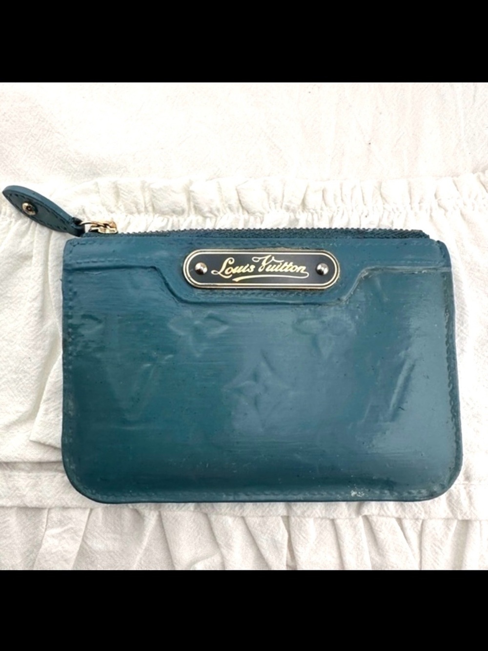 AUTHENTIC Louis Vuitton teal blue coin wallet.